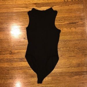 sleeveless black body suit